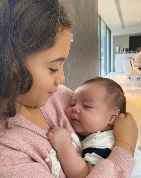 Salome Rodriguez Ospina with her younger brother.